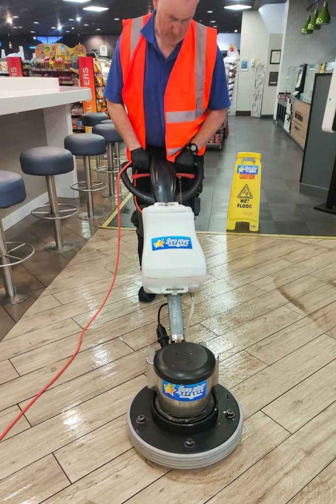 Five Star Refresh worker polishing a ceramic floor in a commercial premises in Roscommon